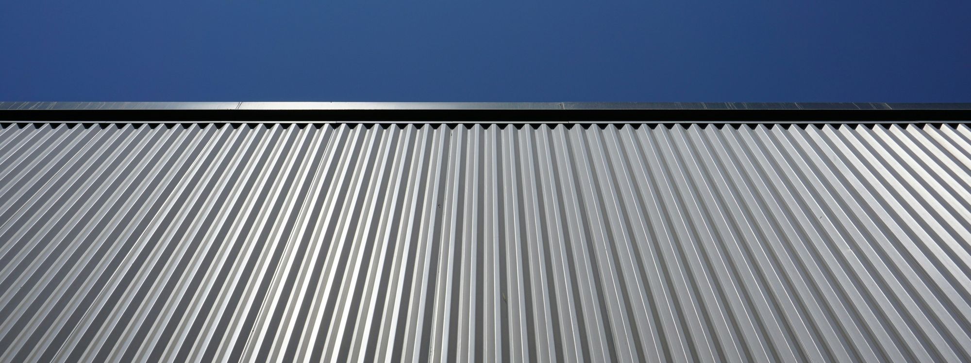 closeup of a standing seam metal roof peak