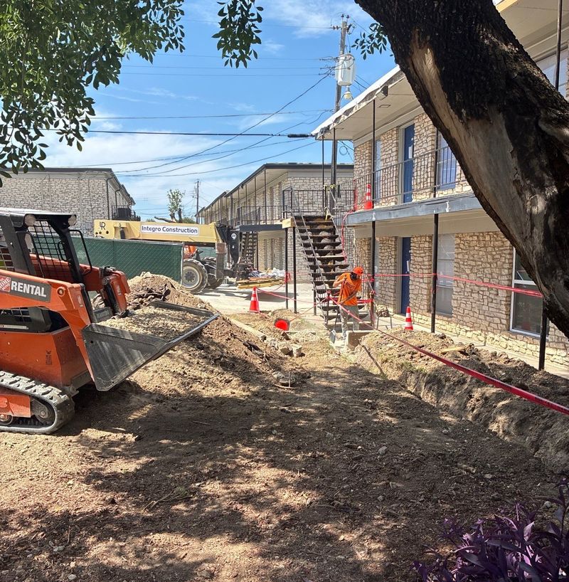 a french drain installation completed as part of a multifamily construction project in Austin, TX